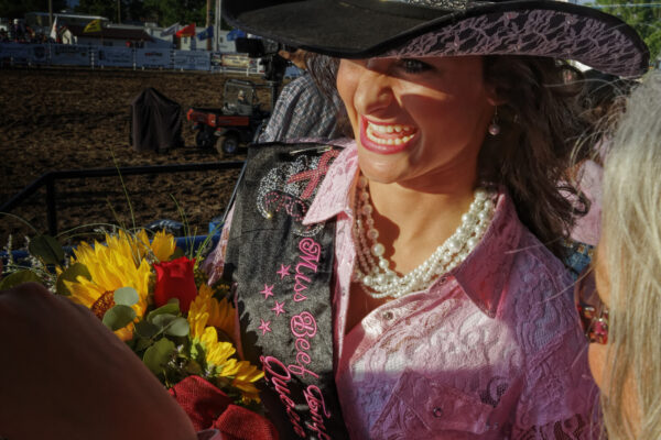 Garden City, Kansas – Beef Empire Days Queen and Princess contest.  Celebrated with flowers for the coronation, winning the title Miss Beef Empire is the highlight of the Rodeo Queen competition.
