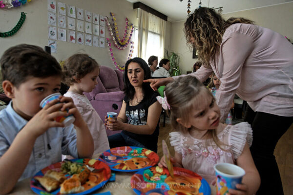 Immigrant Nannies | Istanbul, Turkey
There are multiple families with four immigrant nannies/housecleaners at this birthday party. One is from Turkmenistan the other three are from Uzbekistan. Many domestic workers come illegally or are smuggled in to make money to support their own children and families back home. Some families pay to bring their favorite workers back after they have been deported. Turkey is primarily affected by internal migration.  Istanbul’s population was two million thirty years ago and is now twelve million.
