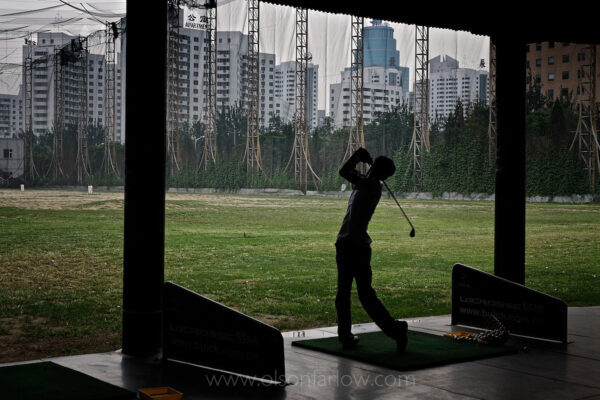 Golf Driving Range, off the Fourth Ring Road lined with skyscrapers.| Beijing, China
