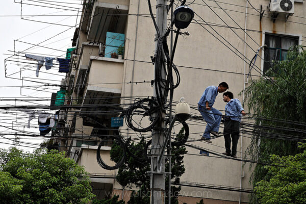The need for electrical power is so great in Shanghai that migrant workers are hired to hook them up by strapping a high voltage wire around their waist and pull it across an already stressed net by walking on the actual wires that bring the electricity.  There is a (dirty) coal power plant coming online every four to five days in China that could power a city the size of San Diego. Energy is wasted on an epic scale. One hundred cities with populations over 1 million faced extreme water shortages last year. China’s survival has always been built on the notion of a vastly powerful, infallible center. Thus, China has poor foundations on which to build the subtle network of institutions and accountability necessary to manage the complexities of a modern economy and society. The lack of independent scrutiny and accountability lies behind the massive waste in the Chinese government and destruction of the environment. Air pollution contributed by these plants kills 400,000 people prematurely every year.
