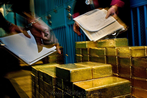 Gold Bars at the Federal Reserve Vault | New York, USA
The door at the vault to the NY Fed says: “Gold is Irresistible.”
At recent prices, one 28-pound gold bar held by the Federal Reserve Bank of New York is worth more than a half million dollars. The Federal Reserve Bank of New York—one of twelve regional capital reserve banks in the system—is located in the heart of the financial district in downtown Manhattan. Moving gold bars just a few feet from one storage closet to another can shape the balance of financial power between nations.
The Federal Reserve Bank of New York holds FIVE percent of the world’s 161,000 tons of gold. That means they must have over 8,000 tons.
