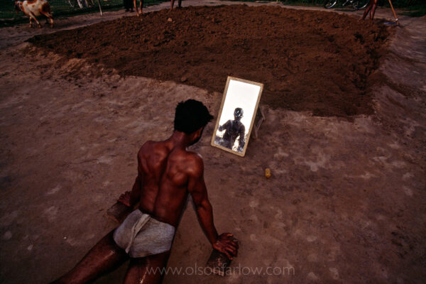A wrestler gets ready for a wrestling match outside modern Harappa town. The town of Harappa flourished around 2000 BC because of its location at the convergence of several trade routes from the northern mountains to the coast. Modern Harappa doesn’t have the river trade and settlement patterns have changed away from this area.

