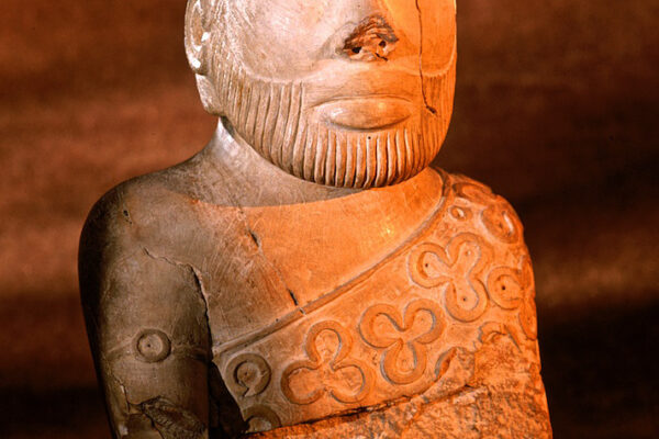 This is the Indus Valley artifact called the Priest King. He is the iconic representation of Indus civilization. He dates to 2200-1900 BC and was found at the Mohenjo Daro archaeological site, Sindh Province, Pakistan.
