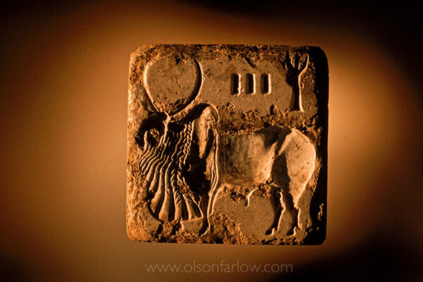 This bull seal dates to around 2450-2200 BC. The bull is one of the least common motifs on seals. A seal is like a credit card it is used to stamp goods and is used as identification in money and goods exchange.
