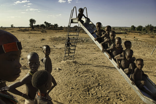 An NGO gave the Hamar village of Logira, a slide, that is heavily used  and a huge attraction to young children living in this harsh landscape. Such organizations have played an increasing role in bringing change and development to the Omo region, building schools, donating water pumps, and even helping broker peace deals between warring tribes.
