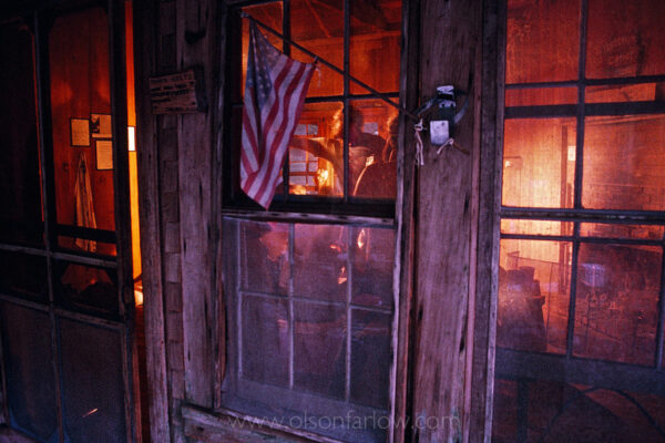 Campers take refuge in a cabin adorned with an American flag as they stop for the night on Billy’s Island while canoeing through the Okefenokee Swamp. There are approximately 70 islands in the Okefenokee, and local lore suggests this one was named for a Native American Seminole chief named Billy, who was murdered on the island.
Established in 1937, the Okefenokee National Wildlife Refuge protects the waters, wilderness, and wildlife of the 402,000-acre Okefenokee Swamp.

