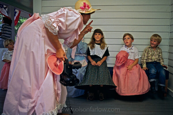 Children are shushed during a prayer at the porch of the homestead where sometimes up to 1,000 relatives gather for the three-day celebration in Waycross Georgia. Traditional family reunion activities include an afternoon luncheon and feature music as well as historic skits that highlight a family’s history.
