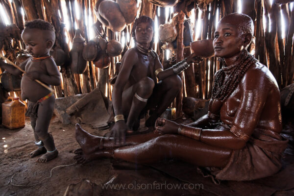 In the Omo Valley, a ritual for a bride involves covering her entire body with butter and ochre clay. The woman will stay in her husband’s family hut for one month before the ceremony and celebration.

