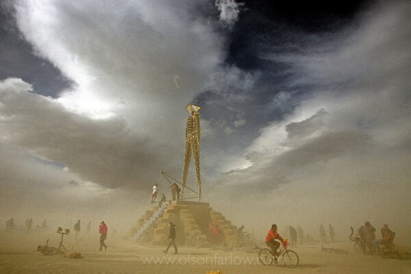 Harsh desert winds swirl around a 70-foot plywood and neon figure shortly before it is ignited in celebration at the end of the Burning Man Festival. For one week each summer, the Black Rock Desert in northwestern Nevada’s Conservation Area becomes home to one of Nevada’s largest cities, populated by tens of thousands of revelers celebrating art and counter-culture experience.
