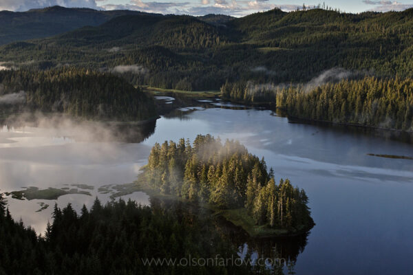 Aerial views of fog lifting over the Thorne River and estuary on Prince of Wales Island in southeast Alaska. The rich ecosystem supports four species of salmon, and as a result, sport fishing has become an important part in the island’s economy as the historic logging industry has declined.
Fjords, steep-sided mountains, and dense forests characterize the island. Extensive tracts of limestone include karst features.
